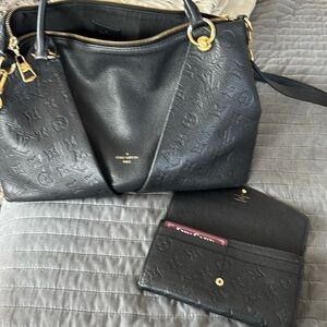 This is a beautiful Louis Vuitton purse. I bought at the Houston Galleria